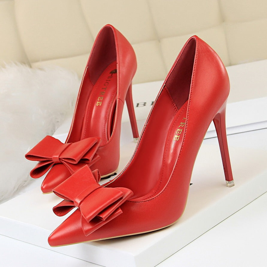 The Celeste Bow Pumps