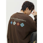 The Umber Outline Printed Crewneck Sweatshirt