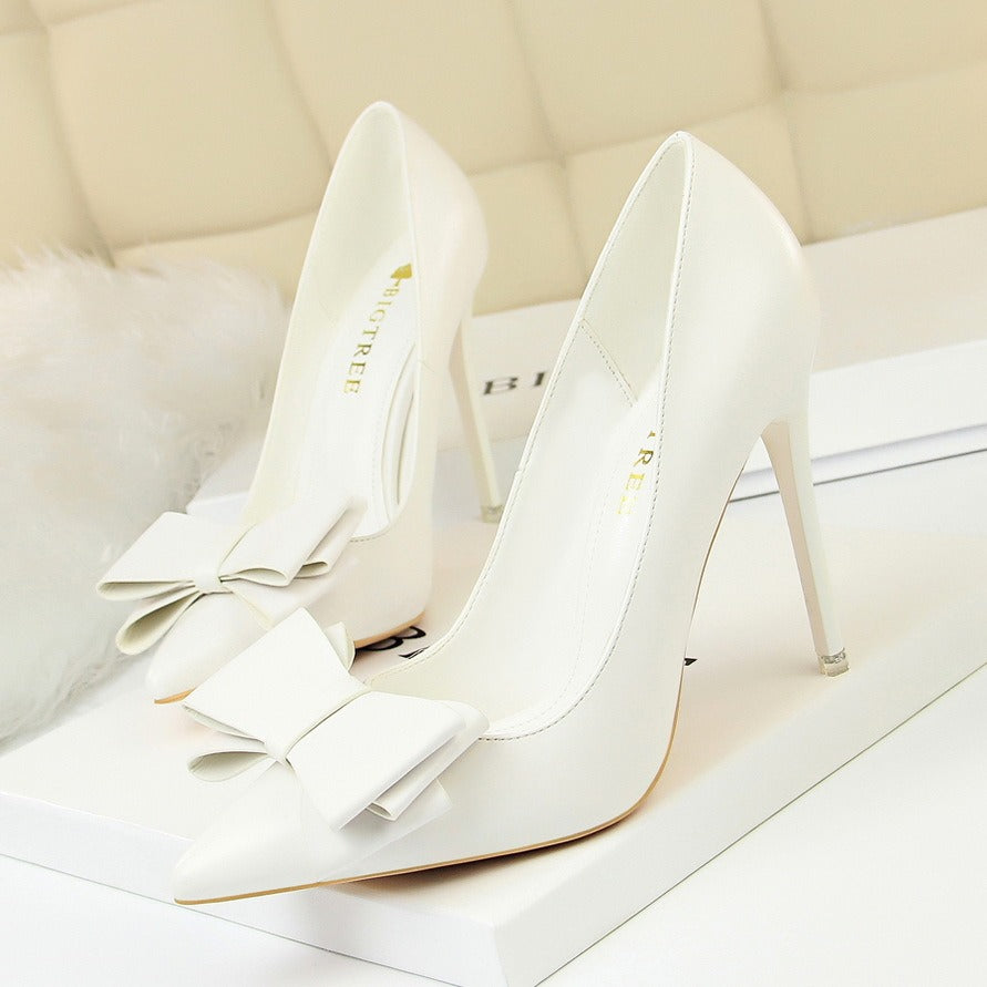 The Celeste Bow Pumps