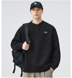 The Sakura Thread Embroidered Henley Sweatshirt