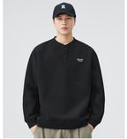 The Sakura Thread Embroidered Henley Sweatshirt