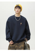 The Quiet Thread Embroidered Round Neck Sweatshirt