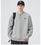 The Sakura Thread Embroidered Henley Sweatshirt