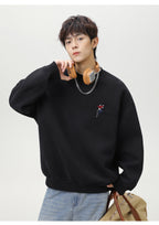 The Quiet Thread Embroidered Round Neck Sweatshirt